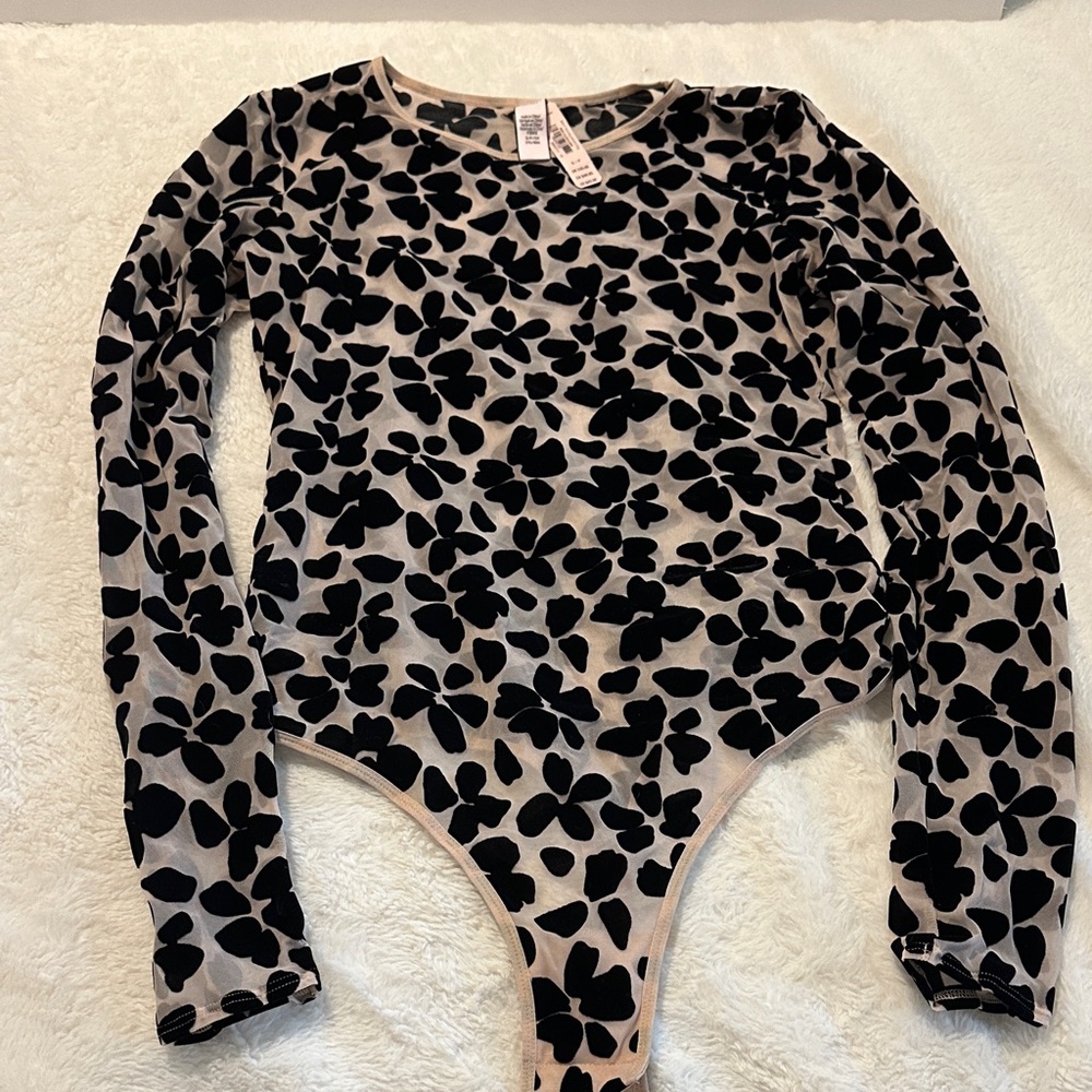 Victoria Secret one piece body suit. Mesh material with velvet pattern. Size S.